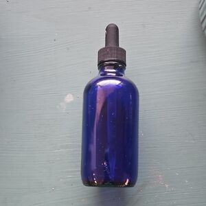 Empty Blue Skincare Serum Glass Bottle